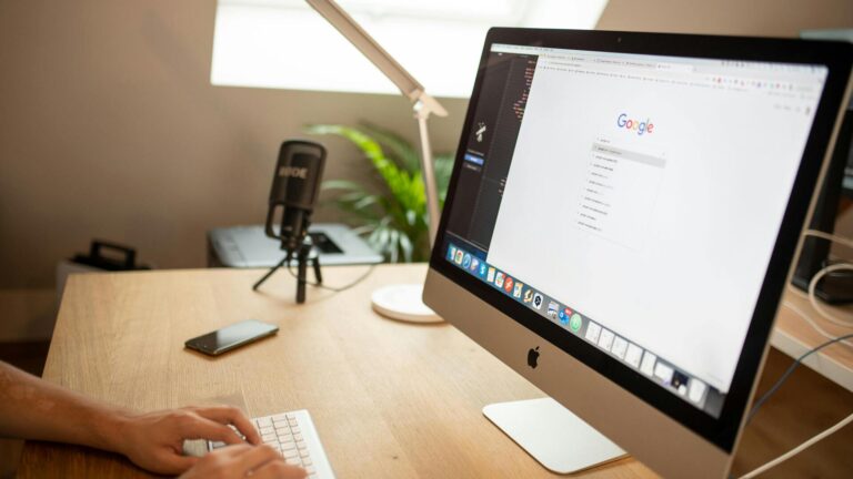 A person typing on a keyboard